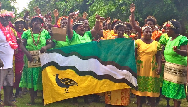 Women in Business Development is working with Simbo island in Solomon Islands, where there has been positive economic and social change occurring. The women here are dressed in elei uniforms as celebrate the opening of new craft houses as part of tourism project on their island